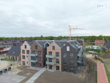 Neubauwohnung mit sonniger Terrasse und kleinem Garten im Neubaugebiet im Timp, 26605 Aurich, Wohnung