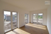 Schlafzimmer - Neubauwohnung mit sonniger Terrasse und kleinem Garten im Neubaugebiet im Timp