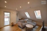 Wohn- und Essbereich - Hochwertige Maisonettewohnung in zentraler Lage von Norden