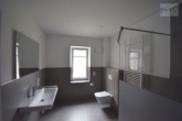 Badezimmer - moderne 2-Zimmerwohnung mit Garten in Norden