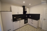 Einbauküche - moderne 2-Zimmerwohnung mit Garten in Norden