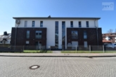 Außenansicht - Moderne Zweizimmerwohnung Erdgeschosswohnung mit kleinem Garten im Zentrum von Aurich