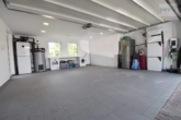 Doppelgarage mit Sektionaltor und FB-Heizung - Exklusives Architektenhaus im Bauhausstil mit Doppelgarage! Provisionsfrei