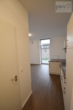 Flur - moderne 1-Zimmerwohnung mit Balkon in Emden