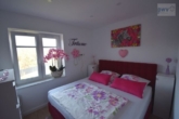 Schlafzimmer - Moderne Maisonettewohnung in zentraler Lage von Norden