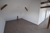 Zimmer II Ansicht III - Loftcharakter! 3-Zimmerwohnung mit gemütlicher Loggia! inkl. Garagenstellplatz!