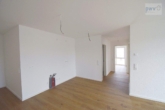 Küche & Zugang Zimmer - Neubauwohnung mit Balkon in Aurich – Erstbezug